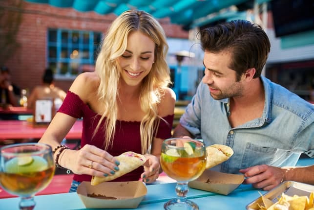 a young couple having dinner together