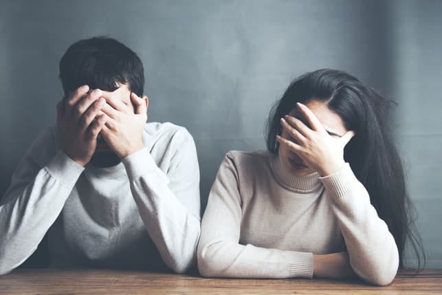 a sad couple after an argument