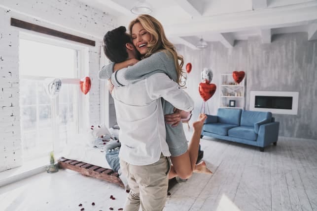 a couple is having a date at home