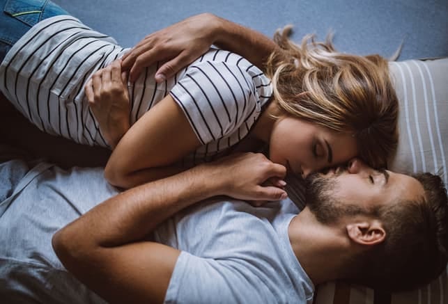 a young couple hugging