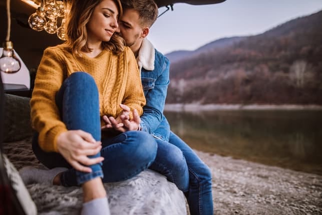 a couple enjoying nature outside together