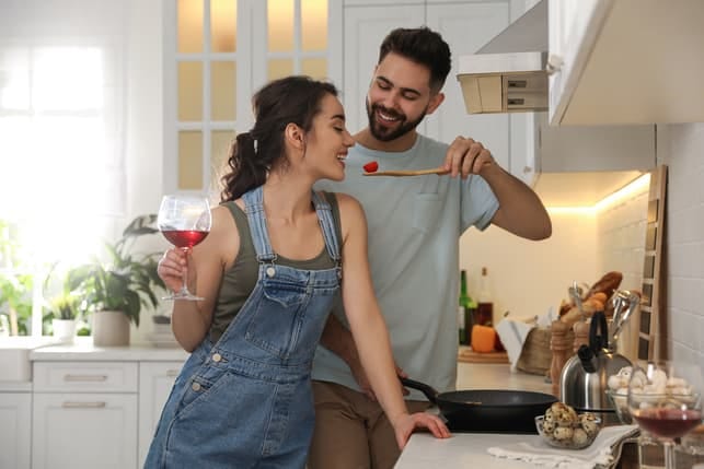 a couple cooking together